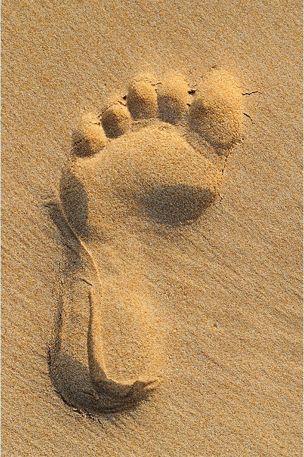 barefoot running in sand